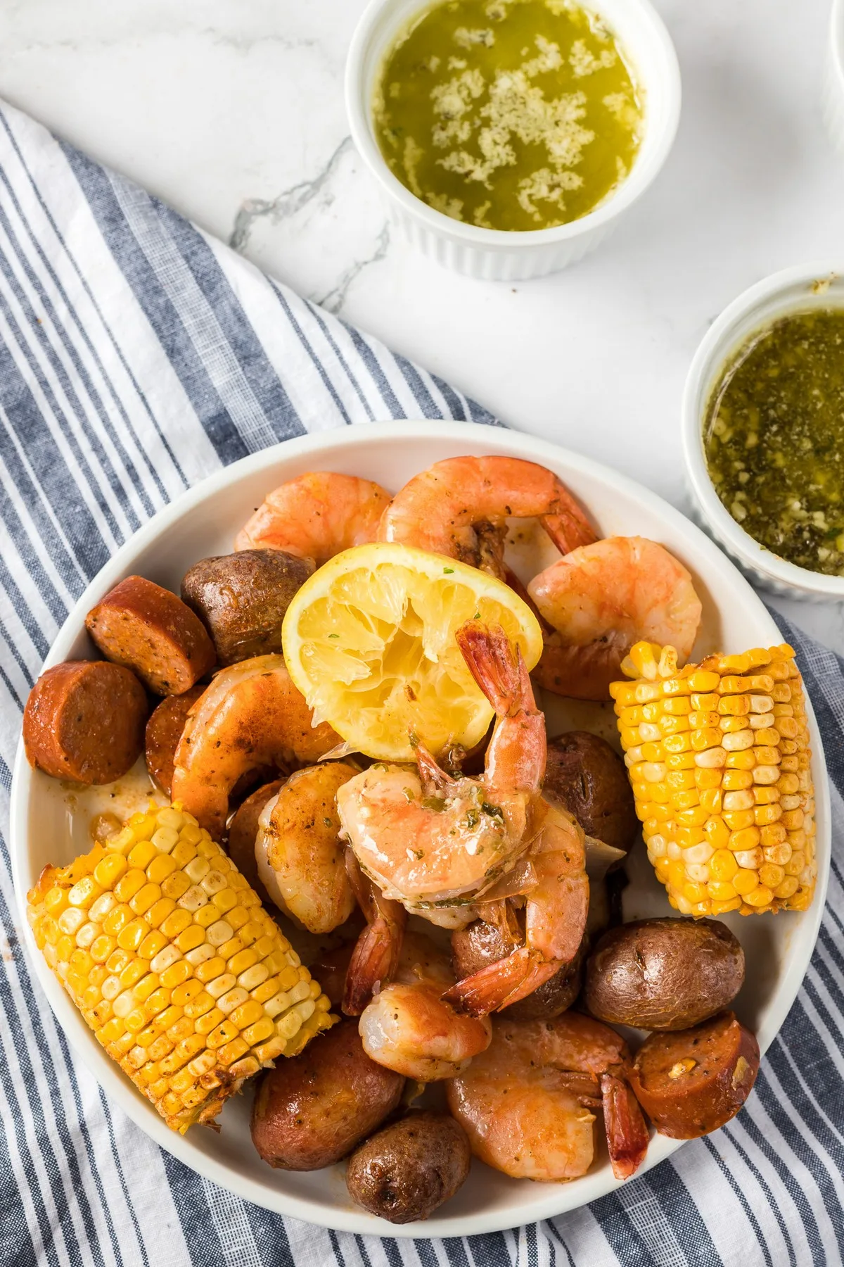Seafood Boil Recipe (with Garlic Butter Sauce) - Britney Breaks Bread
